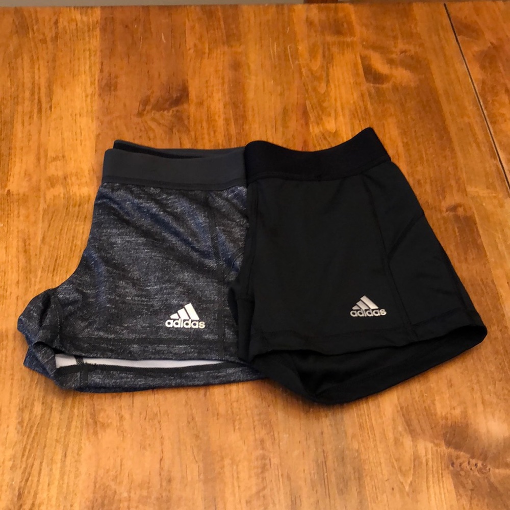 2 pairs of Adidas compression shorts